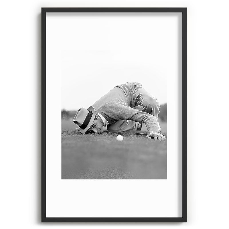 Eye to the ground on the 18th hole; golfing man eyes ball to measure distance to hole vintage black and white portrait photograph - photography - photographs poster Framed Art Print Gallery Image 85