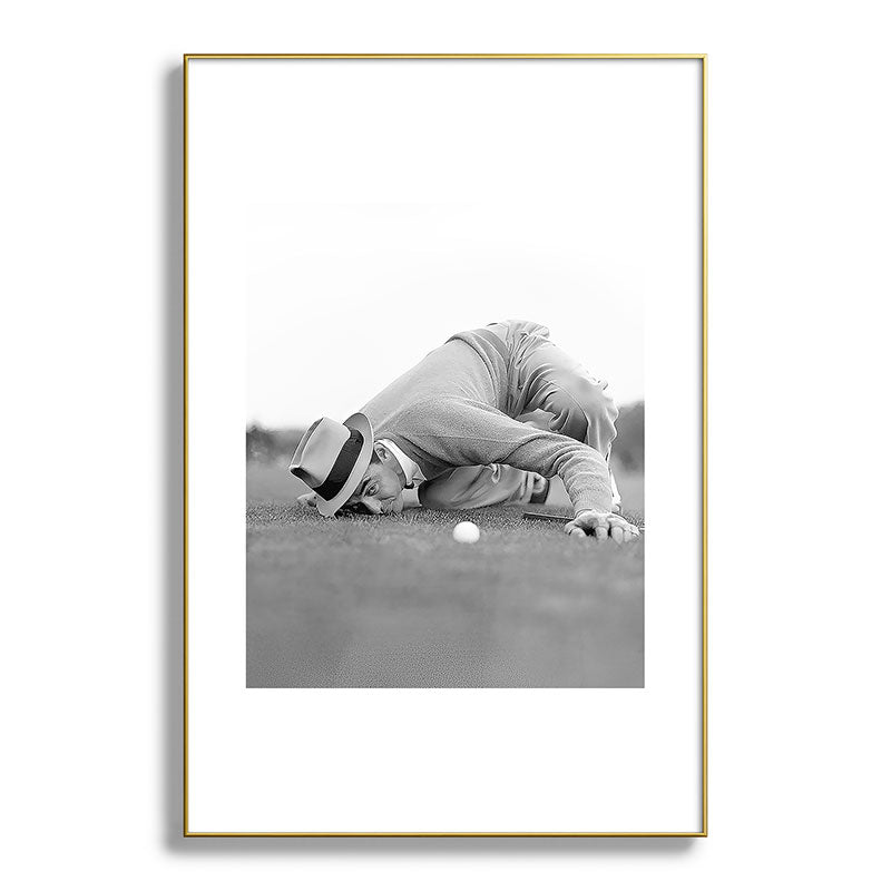 Eye to the ground on the 18th hole; golfing man eyes ball to measure distance to hole vintage black and white portrait photograph - photography - photographs poster Framed Art Print Gallery Image 128